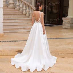 Sexy fascinující dámské svatební šaty s krajkovou aplikací a výstřihem do V, bez rukávů, vysoký rozparek, Abiti Da Sposa na míru - náhled 3