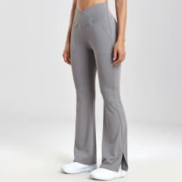Dámské rozšířené legíny s vysokým pasem a kapsami - Slim Fit ležérní jógové kalhoty s bočním rozparkem - náhled 4