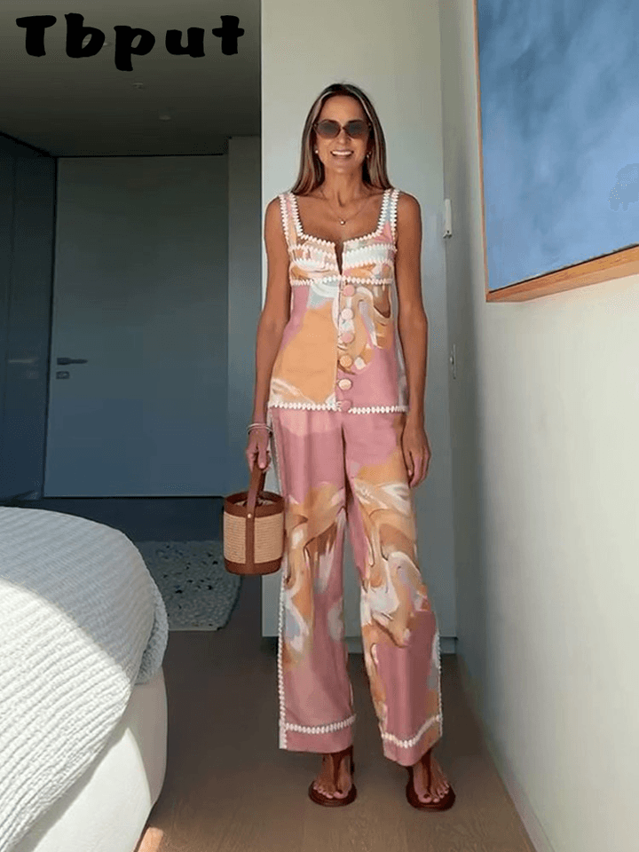 Dámský bezrukávový kalhotový kostým s květinovým potiskem letní elegance 2025