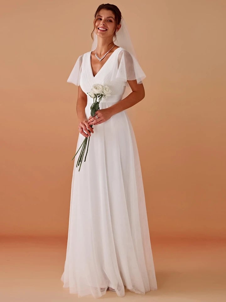 Elegantní bílé svatební šaty s rukávy, sexy výstřih do V, odhalené záda, průsvitné krátké rukávy, svatební šaty áčkového strihu, empírové dámské společenské šaty